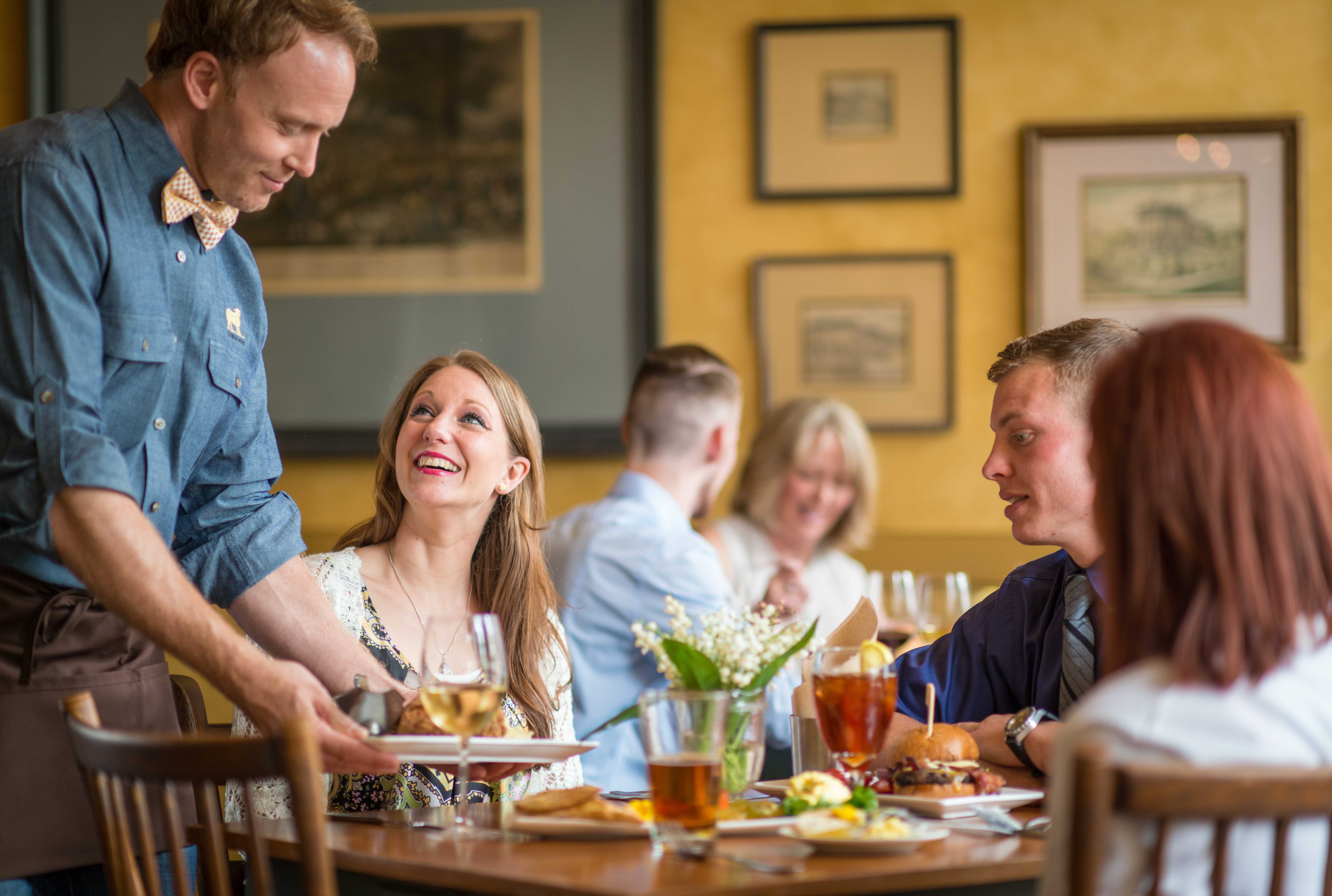 Guests enjoying meal at Golden Lamb Hotel & Restaurant 